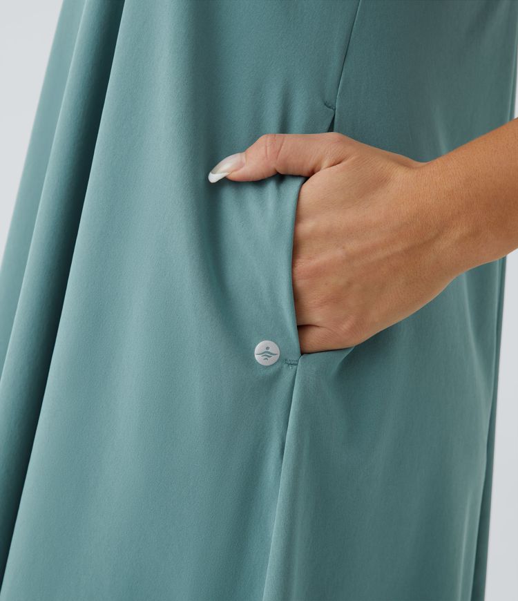 Breezeful™ Rückenfreies, fließendes Midi-Freizeitkleid mit Racerback, Seitentaschen und High-Low-Design - schnelltrocknend
